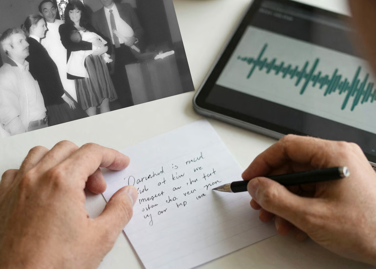 A handwritten note being written next to a tablet showing an audio waveform, with a black-and-white family photograph nearby.
